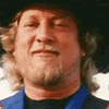 John Anderson: jovencsimo en los aos 80 y el cantante hoy en dia.
