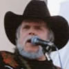 Johnny Paycheck en los 60 y en una de sus ultimas fotos.